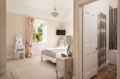 A king-size bedroom at The Victorian Manor, Dorset