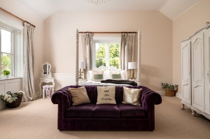 A king-size bedroom at The Victorian Manor, Dorset