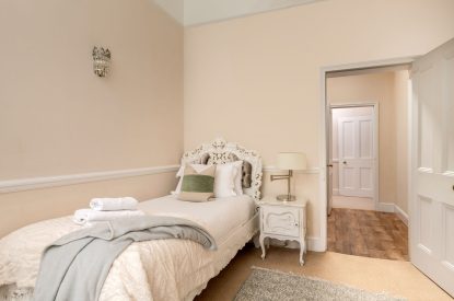 A twin bedroom at The Victorian Manor, Dorset