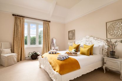 A king-size bedroom at The Victorian Manor, Dorset