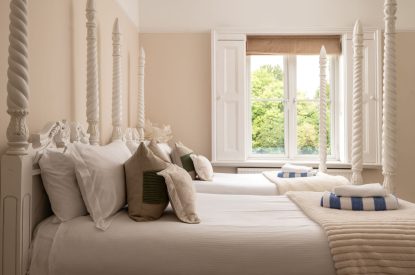 A king-size bedroom at The Victorian Manor, Dorset