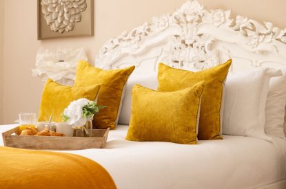 A king-size bedroom at The Victorian Manor, Dorset