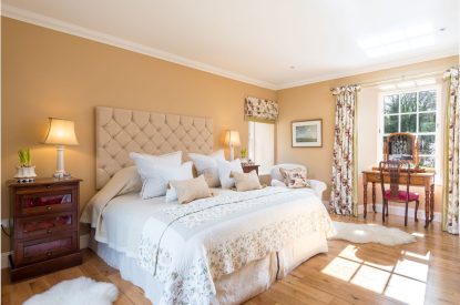 A super-king-size bedroom at Douglas Retreat, Edinburgh