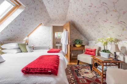 A super-king-size bedroom at Douglas Retreat, Edinburgh