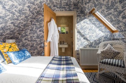 A super-king-size bedroom at Douglas Retreat, Edinburgh