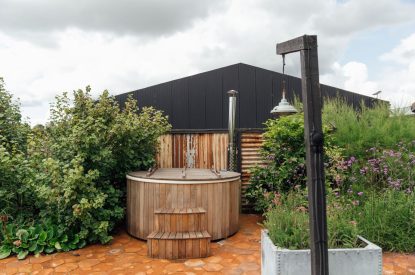 The wood-fired hot tub at Sutton Farmhouse, Leicestershire