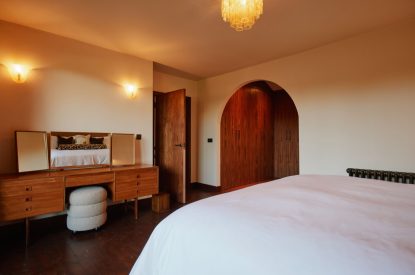 The super-king-size bedroom at Casa Vista, Cotswolds