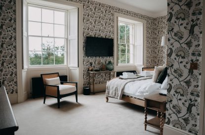 A king-size bedroom at Stoke Hall, Nottinghamshire