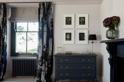 A king-size four poster bed at Bracken Grange, Ceredigion