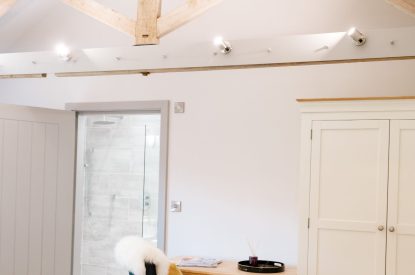 A super-king-size bedroom at Malbank Barn, Cheshire