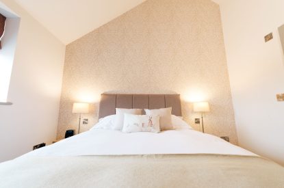 A king-size bedroom at Malbank Barn, Cheshire