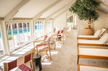 Loungers by the swimming pool at Stoke Hall, Nottinghamshire