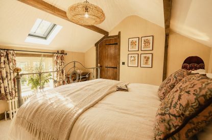 A super-king-size bedroom at Fox Hallow, Cheshire