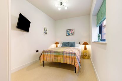 A double bedroom at The Wivenhoe Hideaway, Essex