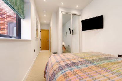 A double bedroom at The Wivenhoe Hideaway, Essex