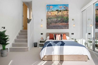 A king-size bedroom at The Wivenhoe Hideaway, Essex