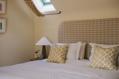 A super-king-size bedroom at Isla Farmhouse, Perthshire