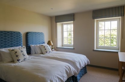 A twin bedroom at Isla Farmhouse, Perthshire