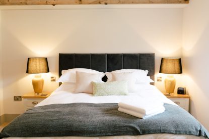 A super-king-size bedroom at Malbank Barn, Cheshire
