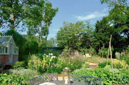 Outdoor seating in the walled garden at Fox Hallow, Cheshire