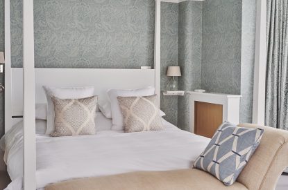 The master bedroom at Coastal Manor Retreat, Hampshire
