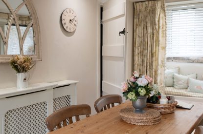 The breakfast table in the kitchen at Wild Rose Cottage, Cotswolds