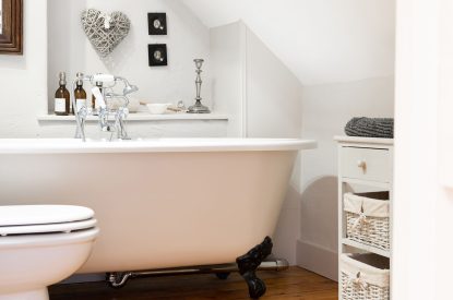 The free-standing bath in the second floor bathroom at Wild Rose Cottage, Cotswolds