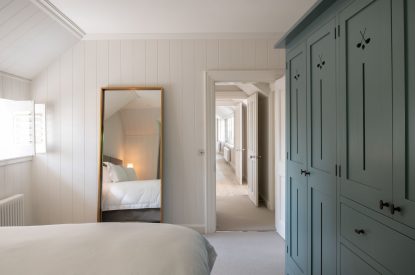 A super king size bedroom at Muirfield Green, East Lothian