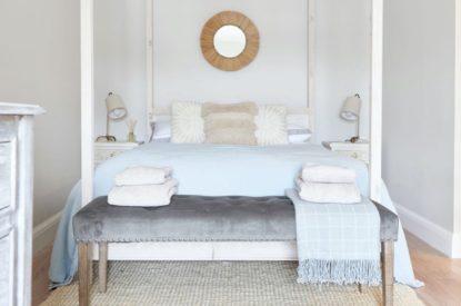 A king size bedroom at Driftwood House, Dorset