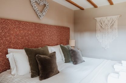 A super-king-size bedroom at The Mill Courtyard, Herefordshire