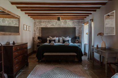 A super-king-size bedroom at The Mill Courtyard, Herefordshire