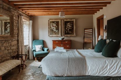 A super-king-size bedroom at The Mill Courtyard, Herefordshire