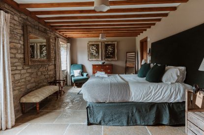A super-king-size bedroom at The Mill Courtyard, Herefordshire