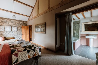 A super-king-size bedroom at The Mill Courtyard, Herefordshire