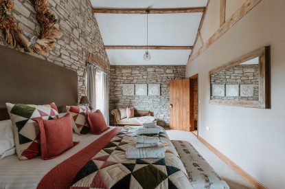A super-king-size bedroom at The Mill Courtyard, Herefordshire
