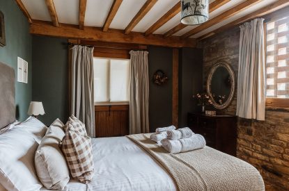 A super-king-size bedroom at The Wainhouse Courtyard, Herefordshire 