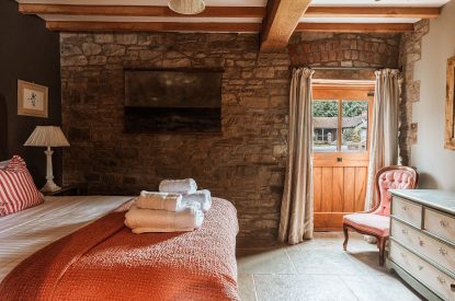 A super-king-size bedroom at The Wainhouse Courtyard, Herefordshire 