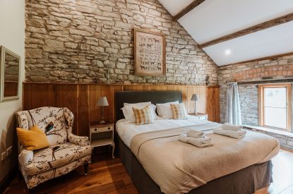 A king-size bedroom at The Wainhouse Courtyard, Herefordshire 