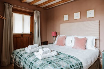 A super-king-size bedroom at The Wainhouse Courtyard, Herefordshire 