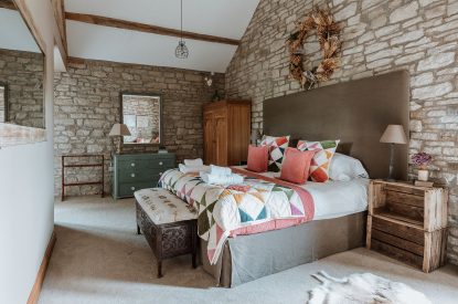 A super-king-size bedroom at The Courtyards at Lyonshall, Herefordshire