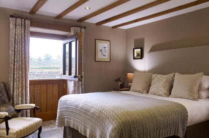 A king-size bedroom at The Mill Courtyard, Herefordshire