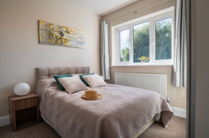 A king-size bedroom at Galley House, Hertfordshire