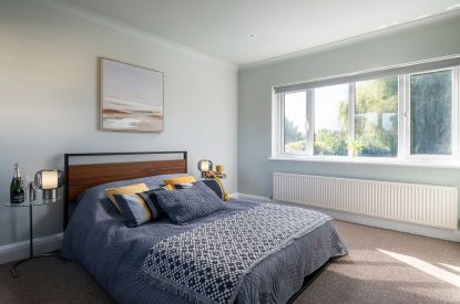 A king-size bedroom at Galley House, Hertfordshire