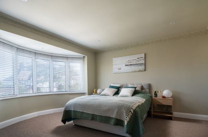 A king-size bedroom at Galley House, Hertfordshire
