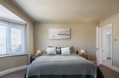 A king-size bedroom at Galley House, Hertfordshire